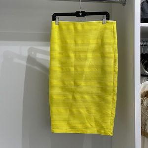 Bright yellow midi pencil skirt